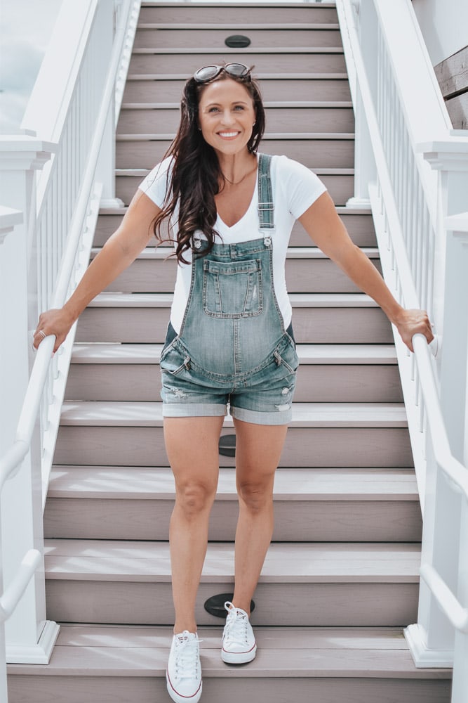 woman in maternity overalls