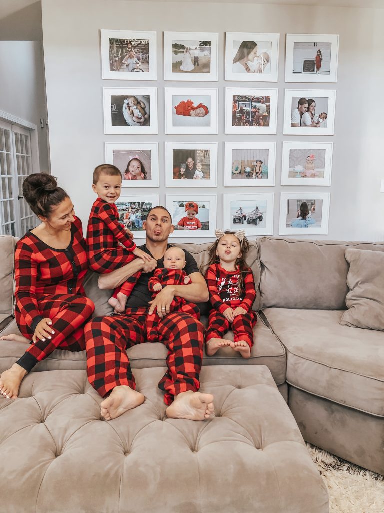 a family wearing matching family pajamas