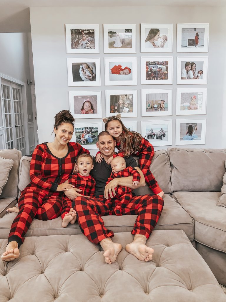 family in matching red pajamas