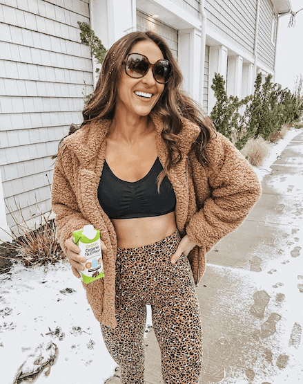woman in leopard leggings and faux fur coat from shein