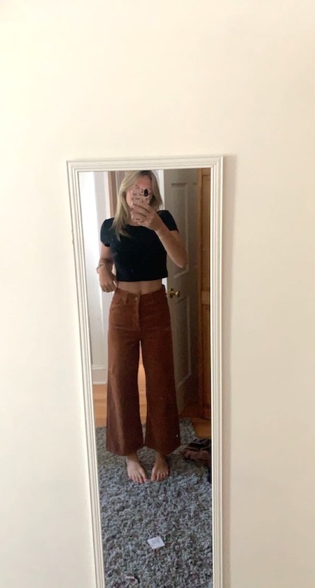 girl wearing brown pants and black top - cute outfits for teen girls