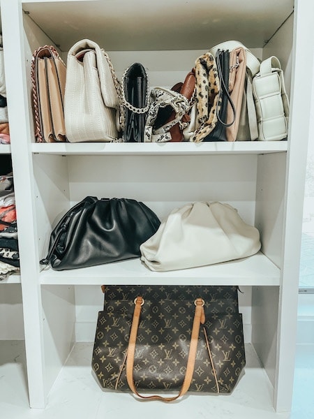 purses organized on a shelf 