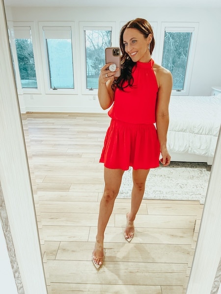 woman in red halter dress