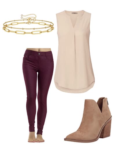 A women's burgundy outfit idea - a cream blouse, burgundy pants, tan cut-out booties, and a gold bracelet