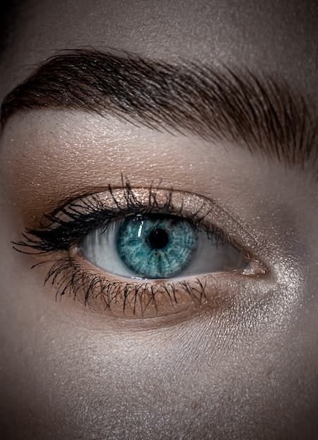 A woman's eye with eye makeup on.