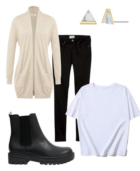 A women's flat boots and jeans outfit idea. 