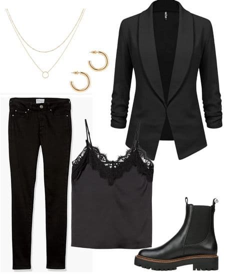 Women's all black outfit including black skinny jeans, gold hoop earrings, a gold layering necklace, a black blazer, a black satin cami, and flat black boots