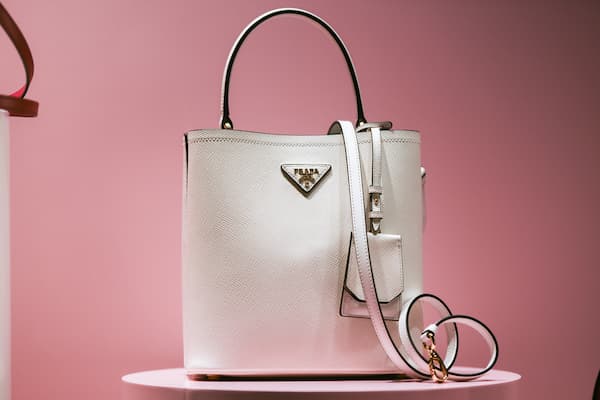 A white Prada handbag.
