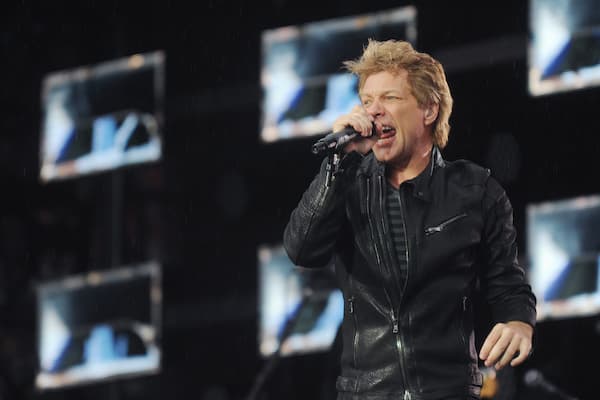 John Bon Jovi performing on stage.
