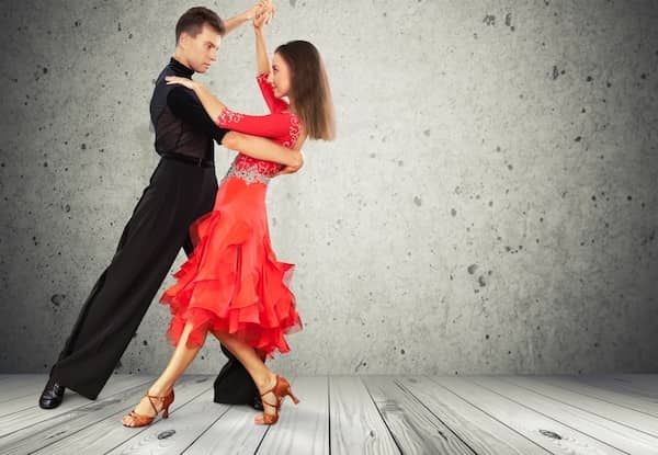 A man and woman dancing Salsa.
