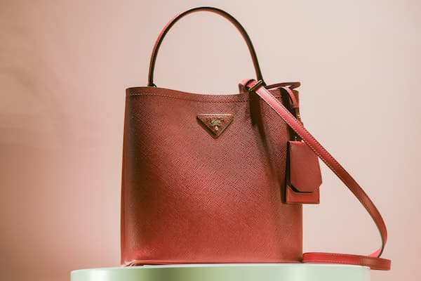 A brown Prada handbag.