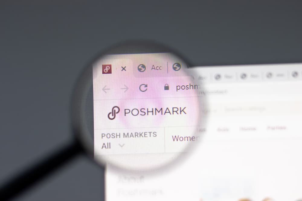 The poshmark website up on a computer screen.