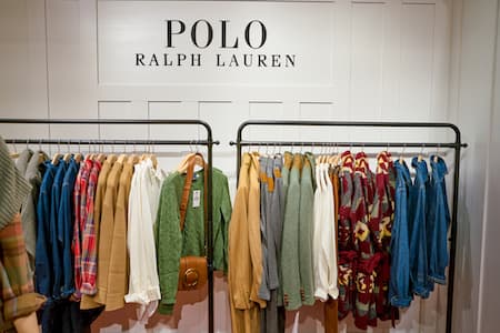 polo ralph lauren clothes on a rack.
